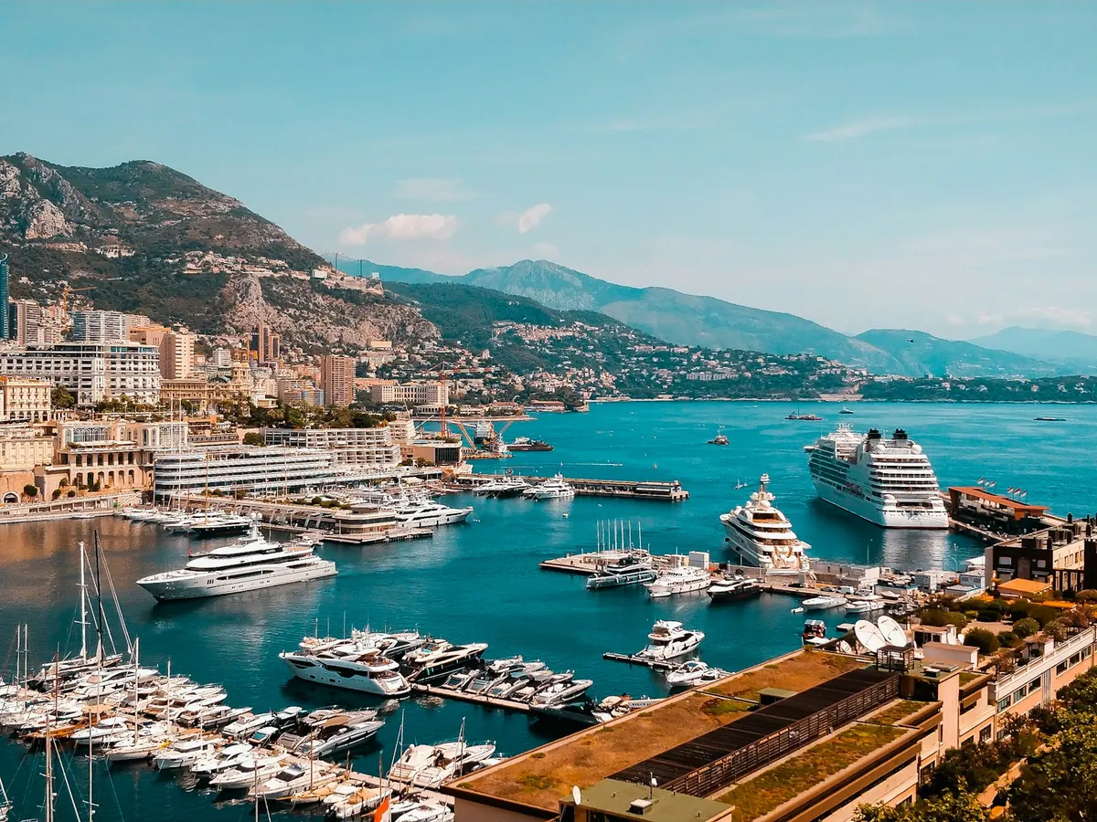Yacht harbour on the Riviera coast beneath steep hills